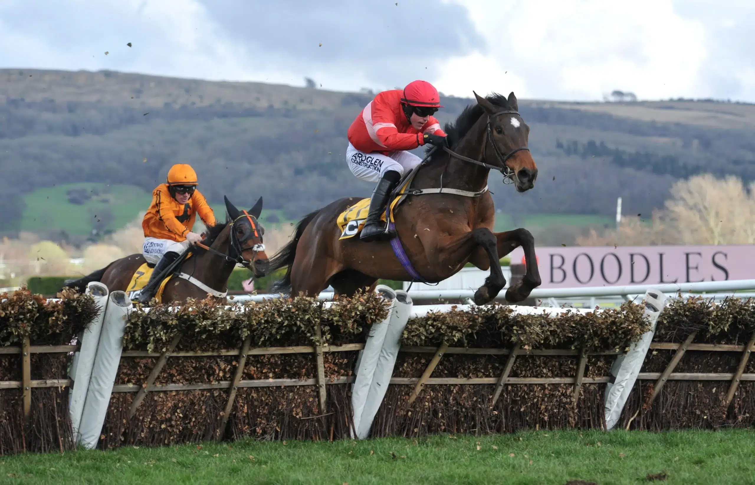 First race 1.30 The JCB Triumph Hurdle. Cinsa ridden by Brian Hayes jumps the last ahead ofJacovec Cavern ridden by Sean Flanagan Horse racing at