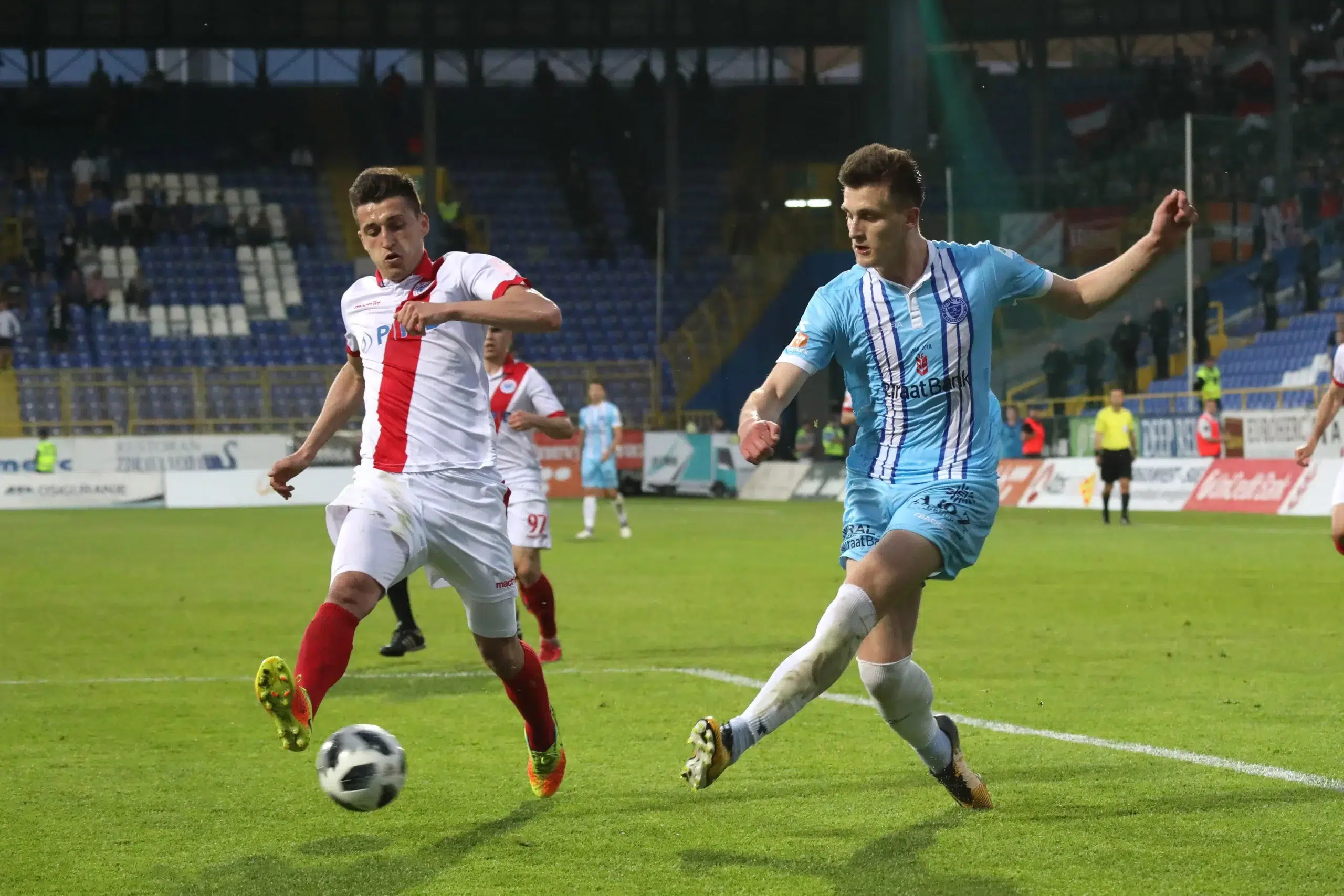 Dzenan Zajmovic (R) of FK Zeljeznicar shoots during a football match of the BH Telecom Premier league