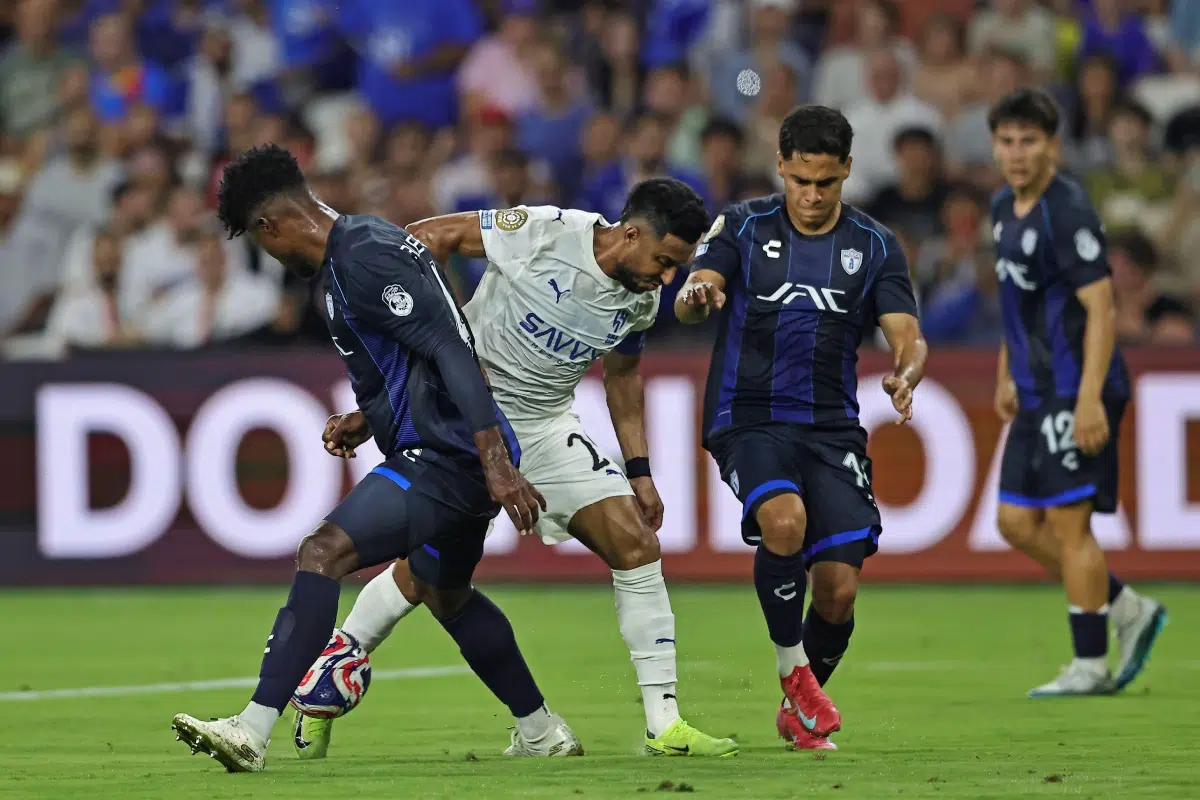 Salem Al-Dawsari of Al-Hilal battles for the ball with Eduardo Bauermann and Carlos Sanchez of CF Pachuca, during Al-Hilal vs CF Pachuca.