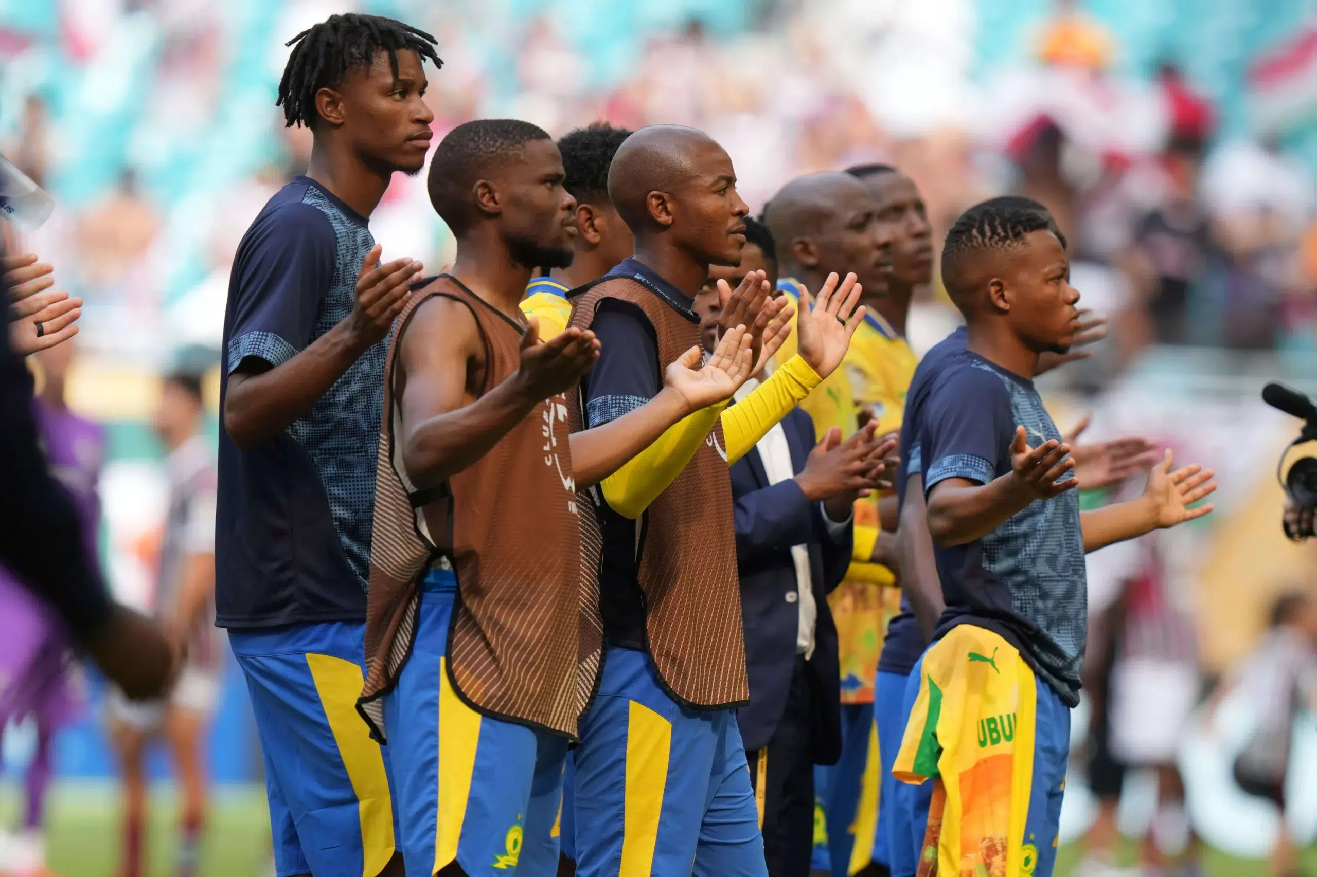 Mamelodi Sundowns players greet fans after the Club World Cup Group F soccer match between Mamelodi Sundowns and Fluminense in Miami Gardens