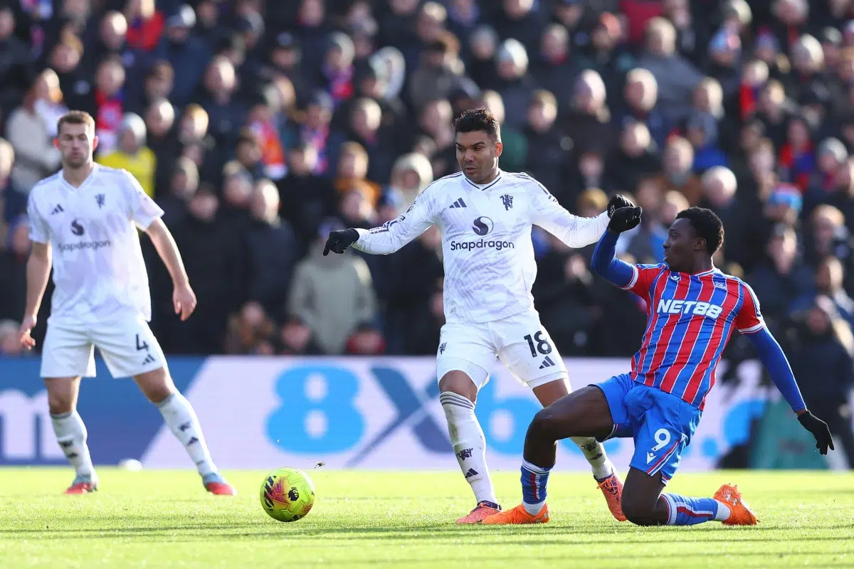 30th Nov, 2025, Casemiro of Manchester United and Eddie Nketiah of Crystal Palace challenge for the ball during the Crystal Palace vs Manchester United Premier League match