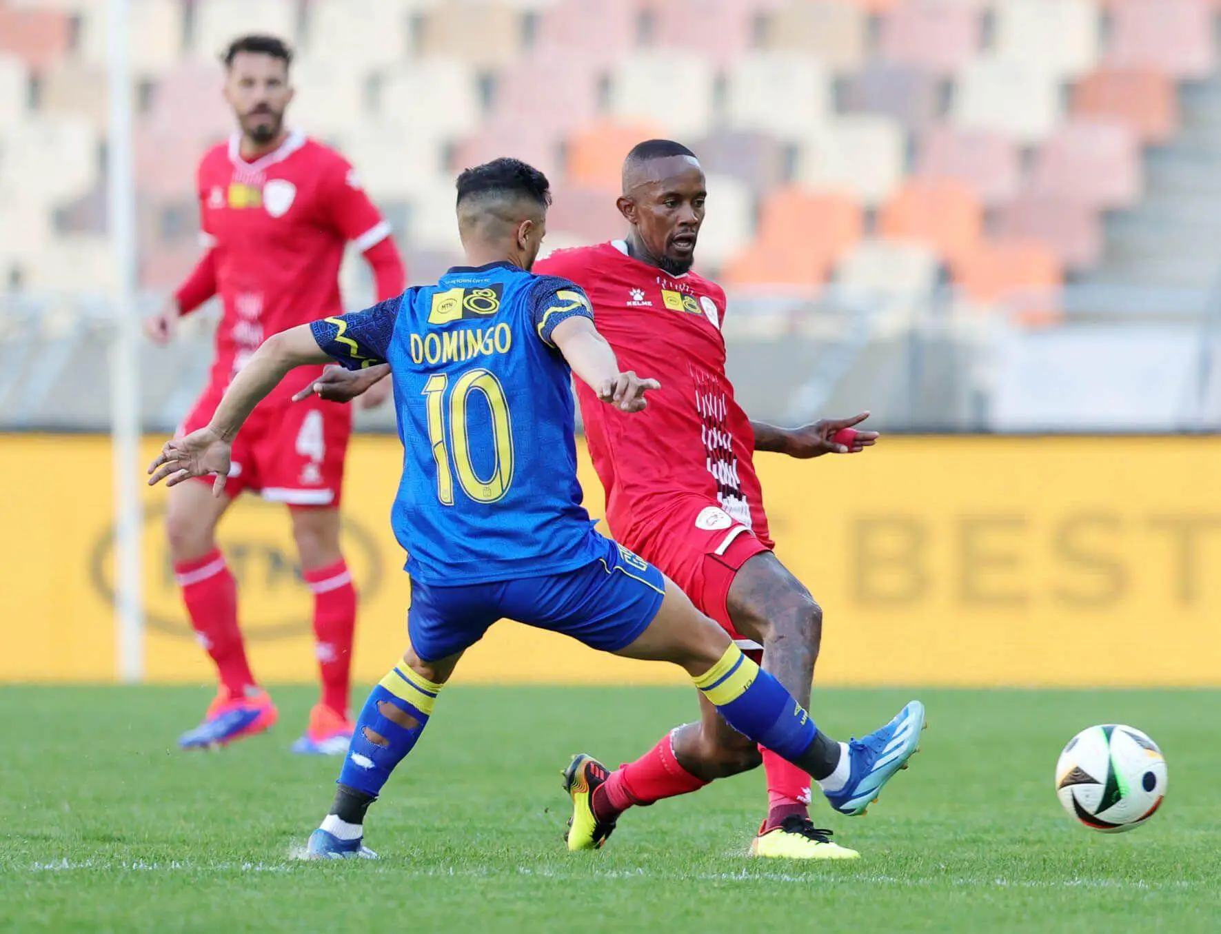 Linda Mntambo of Sekhukhune United challenged by Haashim Domingo of Cape Town City during the 2024 MTN8 quarterfinal match between Sekhukhune United and Cape Town City at New Peter Mokaba Stadium in Polokwane