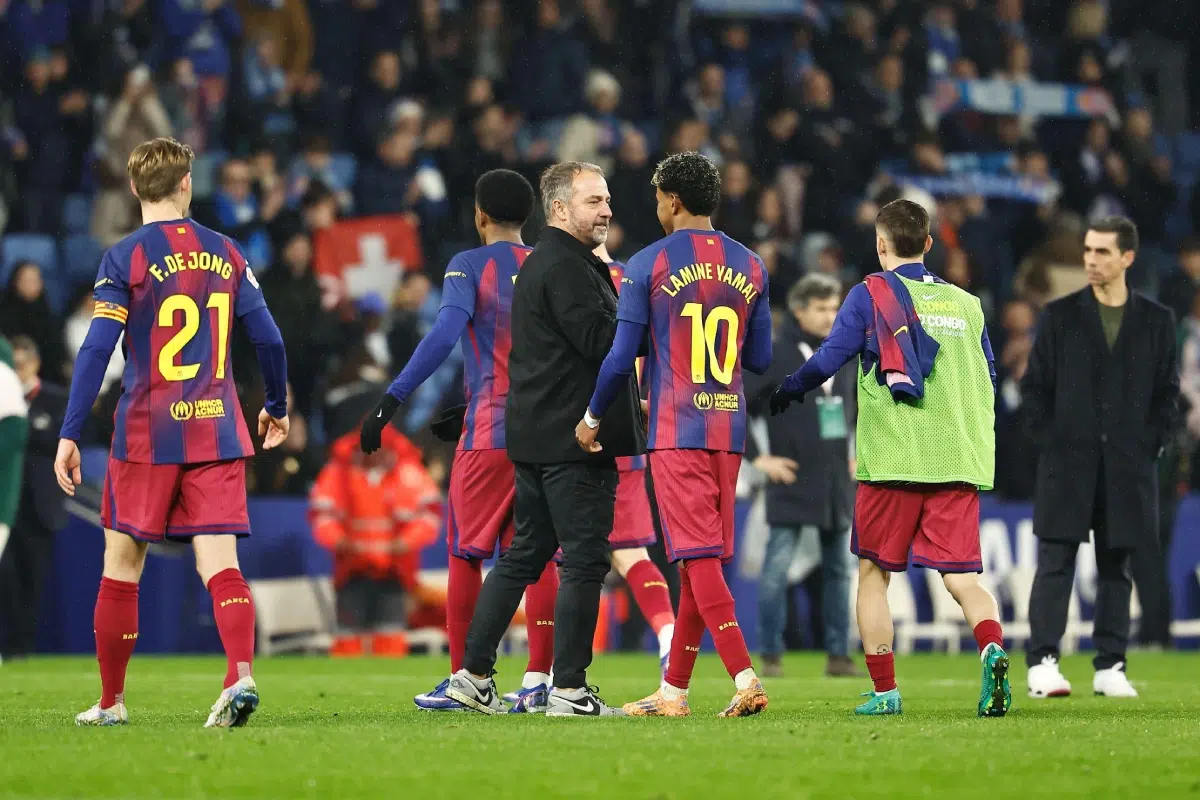 Hansi Flick celebrates with team plyers after winnning Spanish "LaLiga EA Sports" match between RCD Espanyol de Barcelona and FC Barcelona