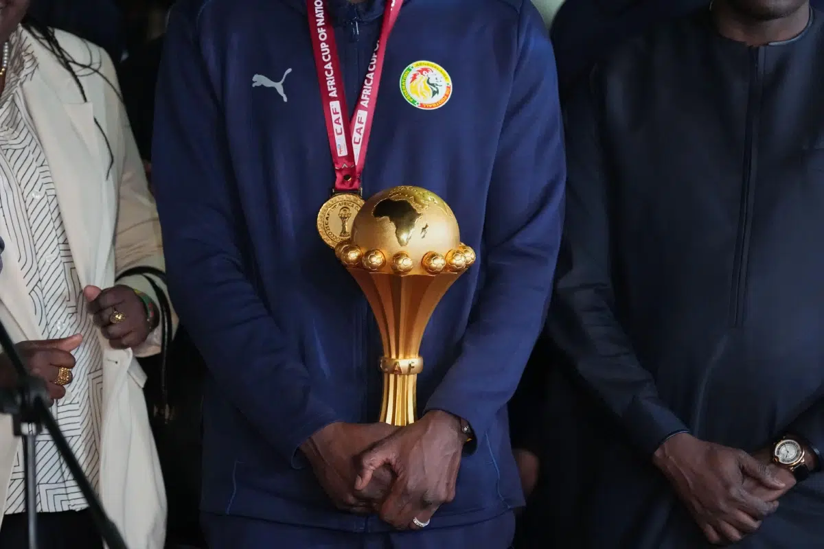 Senegal's Kalidou Koulibaly holds the Africa Cup of Nations trophy, 2026