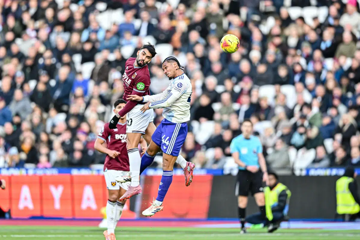 Lucas Paqueta of West Ham and Boubacar Kamara of Aston Villachallenge for the ball during the Premier League match between West Ham United and Aston Villa, 14th December 2025