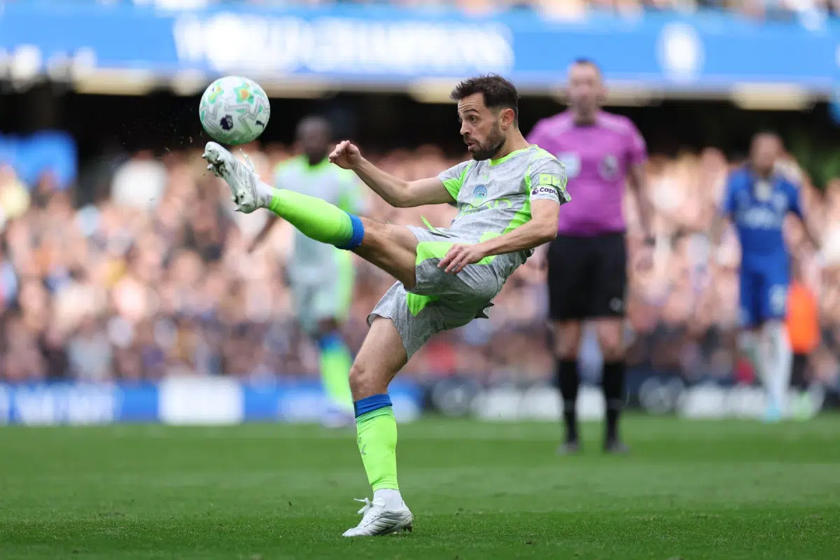 Manchester City's Bernardo Silva clears the ball during the Premier League soccer match between Chelsea and Manchester City, April 12, 2026