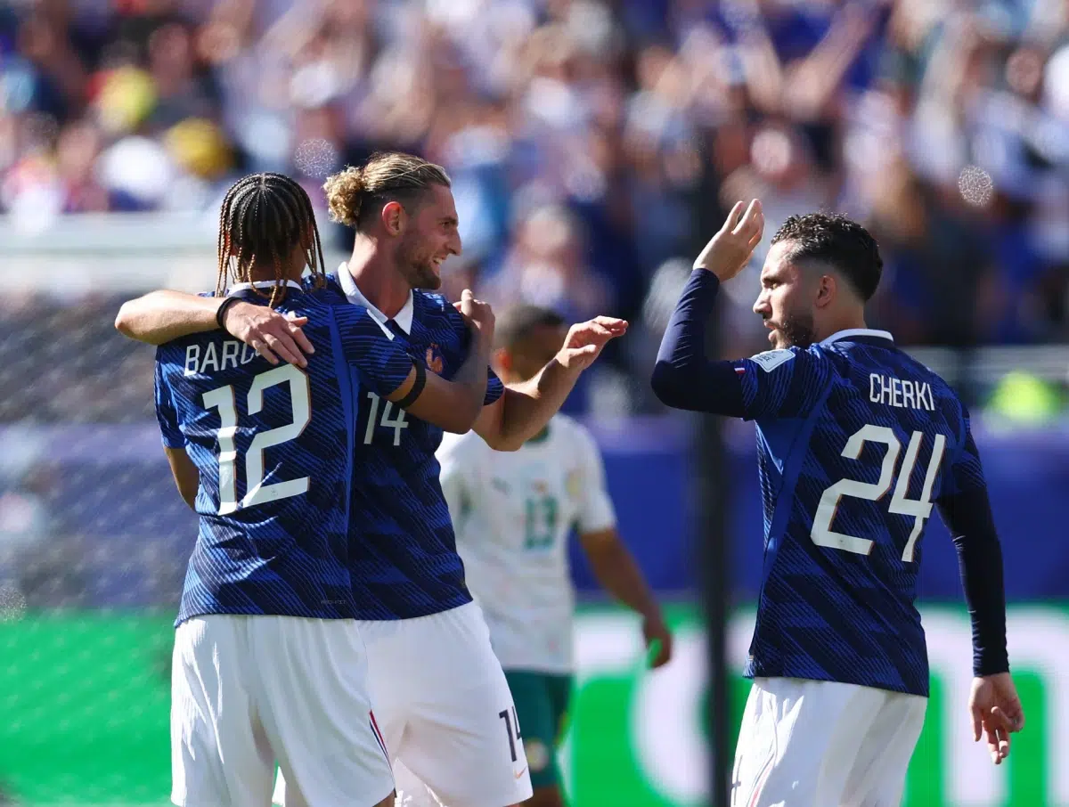 Barcola, Rabiot, and Cherki celebrate at the final whistle during the WC match, 2026