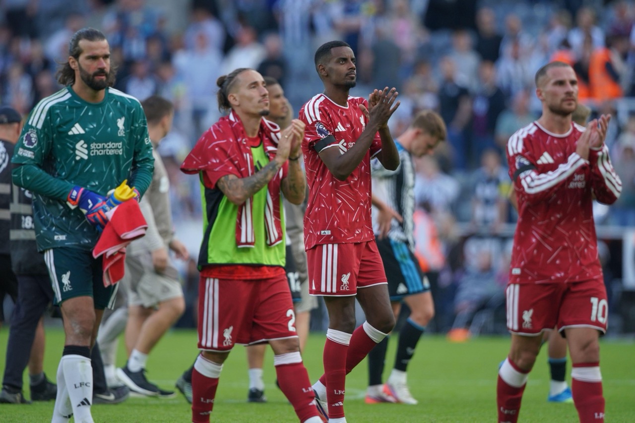 Liverpool's Alexander Isak, center, reacts after the English Premier League soccer match